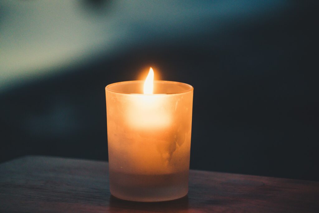 Collard Spiritual Direction - Rethinking Advent - single lit candle by Paolo Nicolello via Unsplash